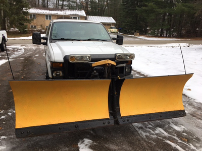 Ready to work F250 4x4 with Fisher 9.6’ V snow plow