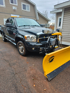 2008 Dodge Ram 2500 4WD with 7 ft. Fisher plow