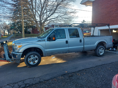 2012 Ford F350 4x4 with V-plow