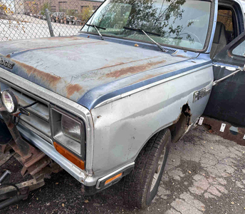 1987 Dodge Ram Charger with plow.