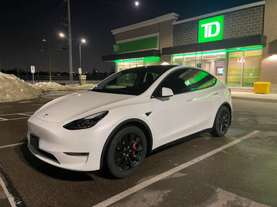 Lightly Driven 2022 White Tesla Model Y Performance