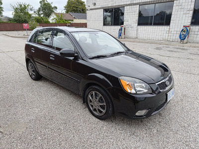 Black Kia Rio 2010 Manual for Sale As in. Great on gas!