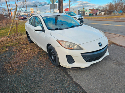 2013 Mazda 3 good condition, 300,000 kms. new winter tirer tires