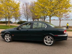 Jaguar X-Type is unmistakably Jaguar. Better still, the X-Ty