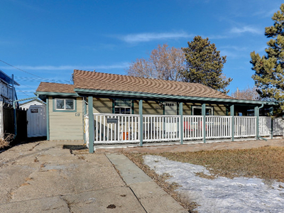 NEW LISTING - BUNGALOW WITH A GARAGE