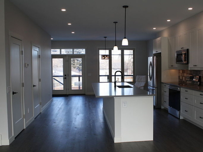 Bright New 3 Bedroom House(no basement) | #1 7612 34th Ave NW, Calgary