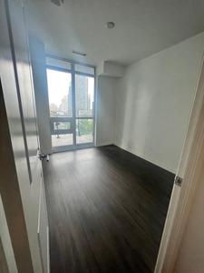 Private bedroom available for rent in 2 bedroom+ den condo