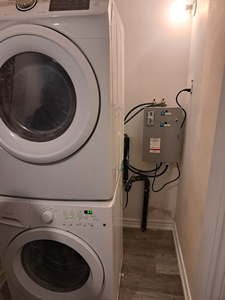 CSA Approved Coin-operated residential washer dryer combination.