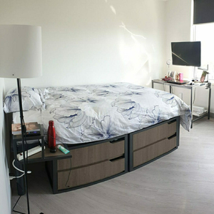 A furnished room in a two-bedroom suite for girls