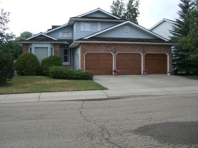 An upstairs furnished bedroom in a nice Blue Quill Estates home