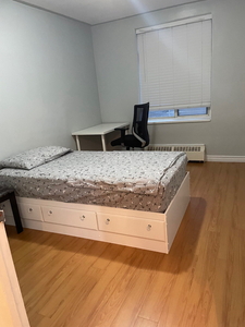 Furnished bedroom in a two bedroom condo