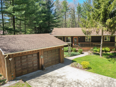 Bungalow on Acre of Woods w 2.5 car garage! dp96444