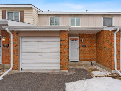 Updated Townhome with walkout basement and attached garage