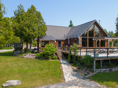 WATERFRONT LOG HOME! - Ashley Jackson & Dylan Dolson, RE/MAX