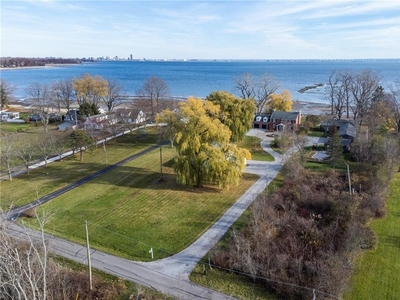 Discover The Epitome Of Refined Lakefront Living At 2301 Staniland Park Road.