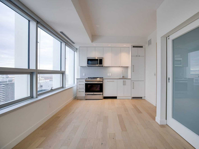 Modern one-bedroom condo unit in SKY Residences / Stantec Tower