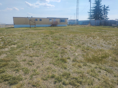 Commercial Industrial lot for sale or rent, currently Auto Sales