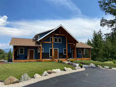 Custom home on 5+ acres in Salmon Arm w/ potential rental income
