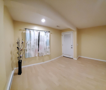 Cozy walk-out basement suite with own parking