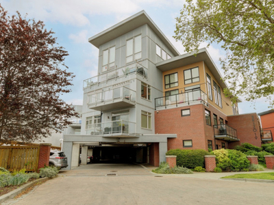 1200 Sq Ft Two-Storey Penthouse Condo - 2 bedroom, 2 bath + den.