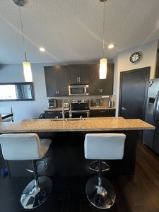 Calgary Room For Rent For Rent | Auburn Bay | Cozy Basement Suite Auburn Bay Kitchen&Entrance