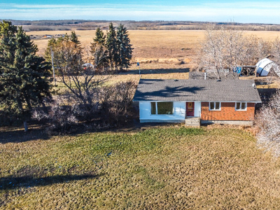6 beds with In-law suite 8.6 acres 1 km west of Lamont, AB