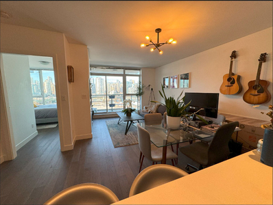 Large 700 sq ft 1 bdrm and den Condo in Olympic Village with Air