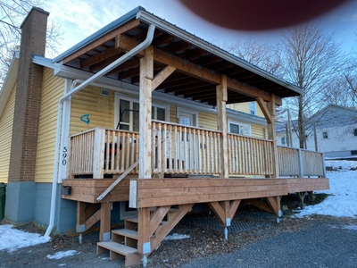 ON HOLD: Bright, central 2-bedroom with large private deck