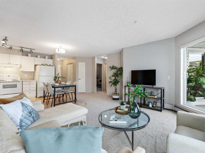 JUST LISTED!! 1 BDRM + DEN CONDO IN SW CALGARY!!