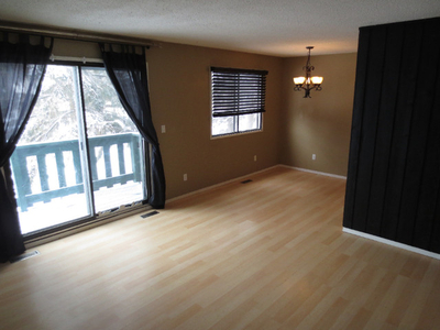 2 Bedroom + Den, Bi-Level Fourplex in Normandeau Red Deer