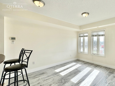 NEWLY RENOVATED 1-BEDROOM CONDO-TOWNHOUSE WITH PARKING