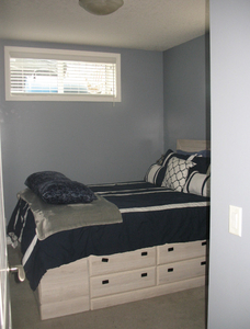 Cochrane - furnished bedroom and bathroom