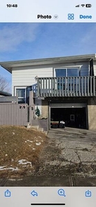 Well kept 3 bedrooms with full basement and garage half duplex $1849 a month. | 6046 8 Avenue Southeast, Calgary