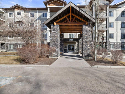 JUST LISTED!! AFFORDABLE 2 BDRM +DEN CONDO IN NW CALGARY!!