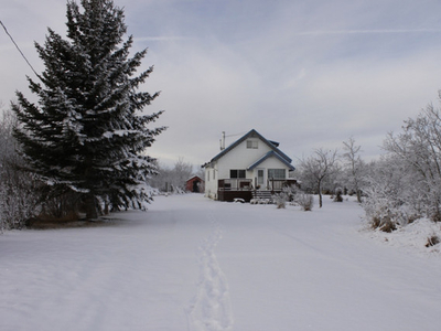 5.43 acres with 1.5 Storey home and heated shop SW of Ryley!