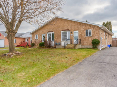 All brick semi detached home with in law suite potential!
