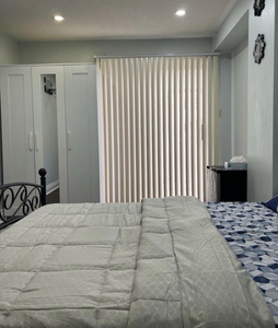 Furnished bedroom with attached bathroom separate entrance